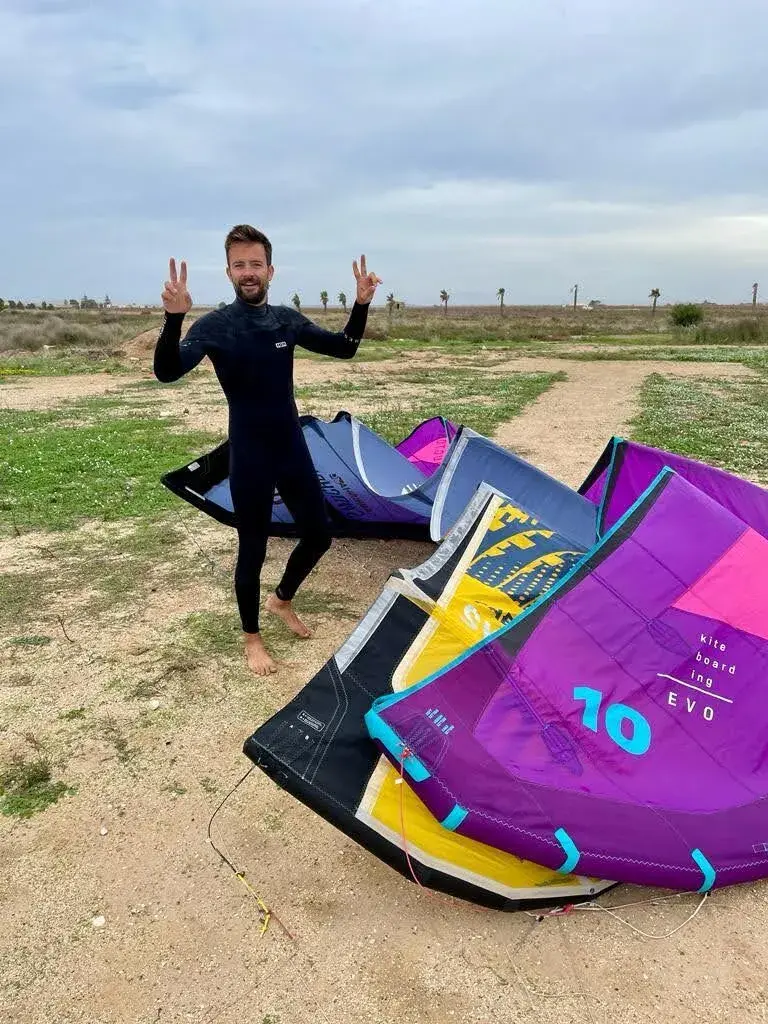 Happy people kitesurfing